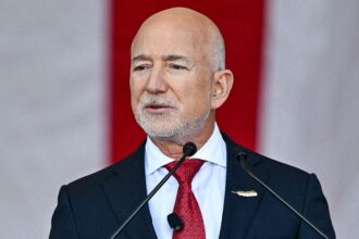 Jeff Bezos confronted on Washington Post layoffs, argues paper must be profitable regardless of his wealth