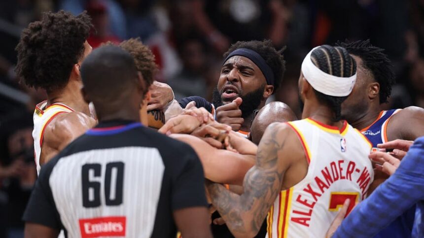Two players ejected after scrum amid Knicks' 50-point lead vs. Hawks sends referee crashing to the court