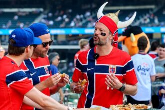 Norwegian World Cup fans turn Citi Field bleachers into a Viking longship during Mets game