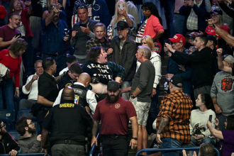 Protester punched in face by Trump supporter, mocked by president at Ohio rally: 'Gotta go on a diet'