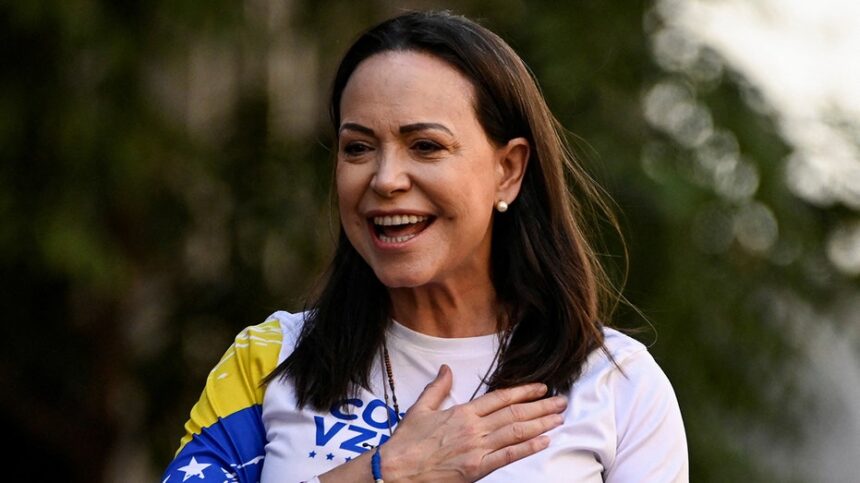 Venezuelan opposition leader MarÃ­a Corina Machado makes surprise return home after nearly a year abroad
